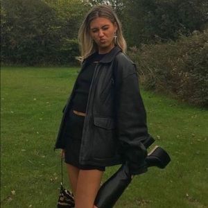 Oversized black leather jacket
